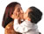 Mother kissing son